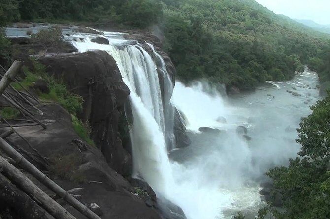 Athirappally & Vazhachal Waterfall Tour with Lunch - Stop 1: Thumboormuzhi Dam & Garden for an easy, scenic start