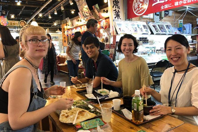 Experience the energy of Kochi: Sunday Market Tour includes Kochi Castle - Obiyamachi Old Town Shopping Street: Covered Comfort for Rainy Days